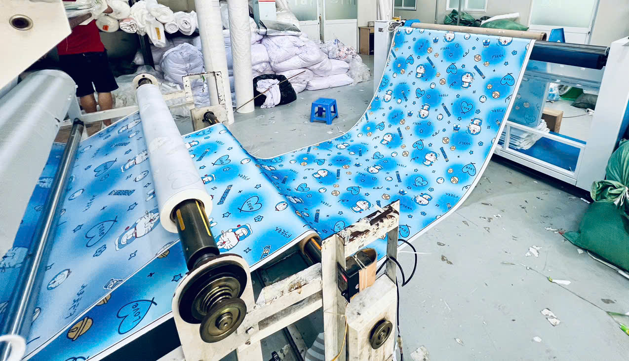 Dàn xả cuộn vải in hoạt hình xanh da trời